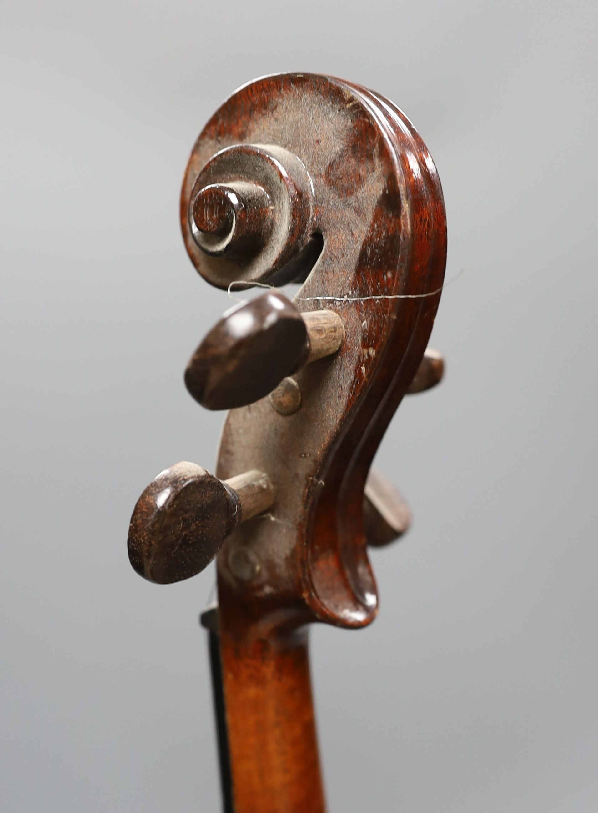 A cased 19th century violin